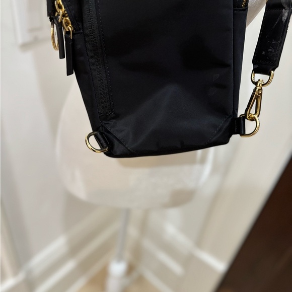 TUMI crossbody sling travel bag Great condition Black gold trim no odors/ tears - Picture 10 of 13